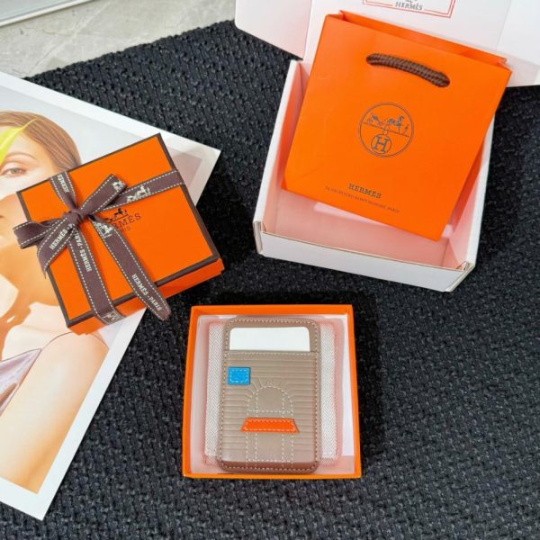 replica,repliche,fake,1:1,earrings,bracelet,ring,jewelry Nuovo porta carte magnetico MagSafe HERMES (QYK40W)