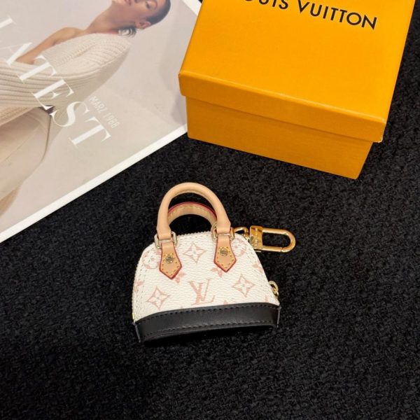 replica,repliche,fake,1:1,earrings,bracelet,ring,jewelry Nuovo prodotto M01706 Portachiavi Louis Vuitton Mini Shell Bag MICRO ALMA VERNIS (ZMLGKM)