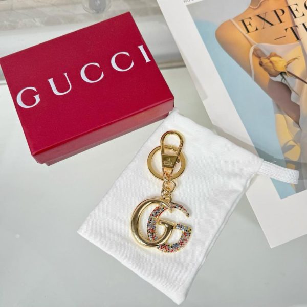 replica,repliche,fake,1:1,earrings,bracelet,ring,jewelry Portachiavi Gucci con doppia G tempestato di diamanti (6EOX7W)