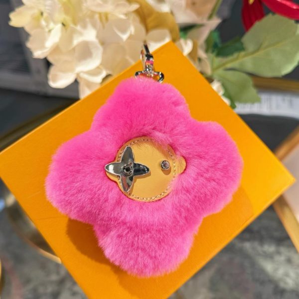 replica,repliche,fake,1:1,earrings,bracelet,ring,jewelry Nuovo arrivo: portachiavi/ciondolo per borsa LOUIS VUITTON VIVIENNE SHEARLING con pompon a forma di girasole (FWAGW8)